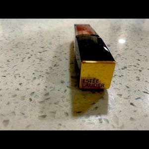 Ester Lauder Lipstick.Red and shiny color.